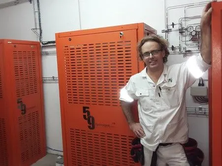 Gareth Gregory, North American Head of ESSNA, standing inside a hydrogen generation unit after installation