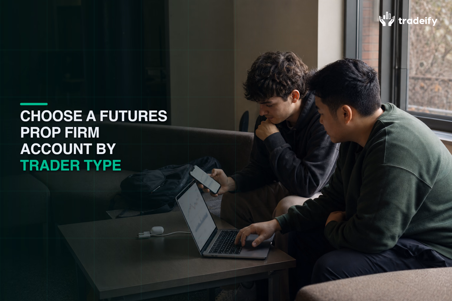 Two young traders comparing phone-first and laptop workflows in a college student-union lounge