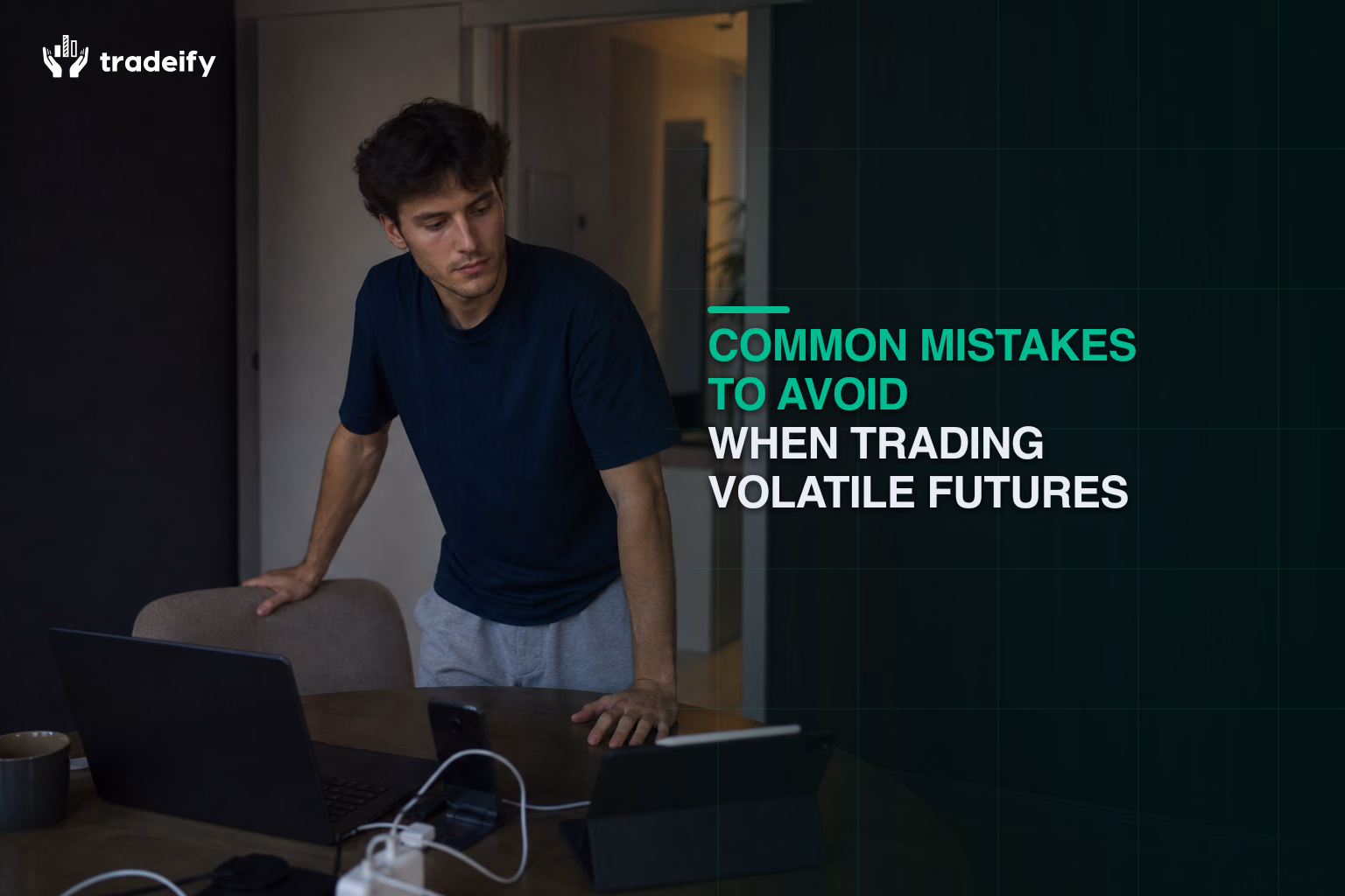 Young trader stepping back from an overextended multi-device setup after a volatile futures session