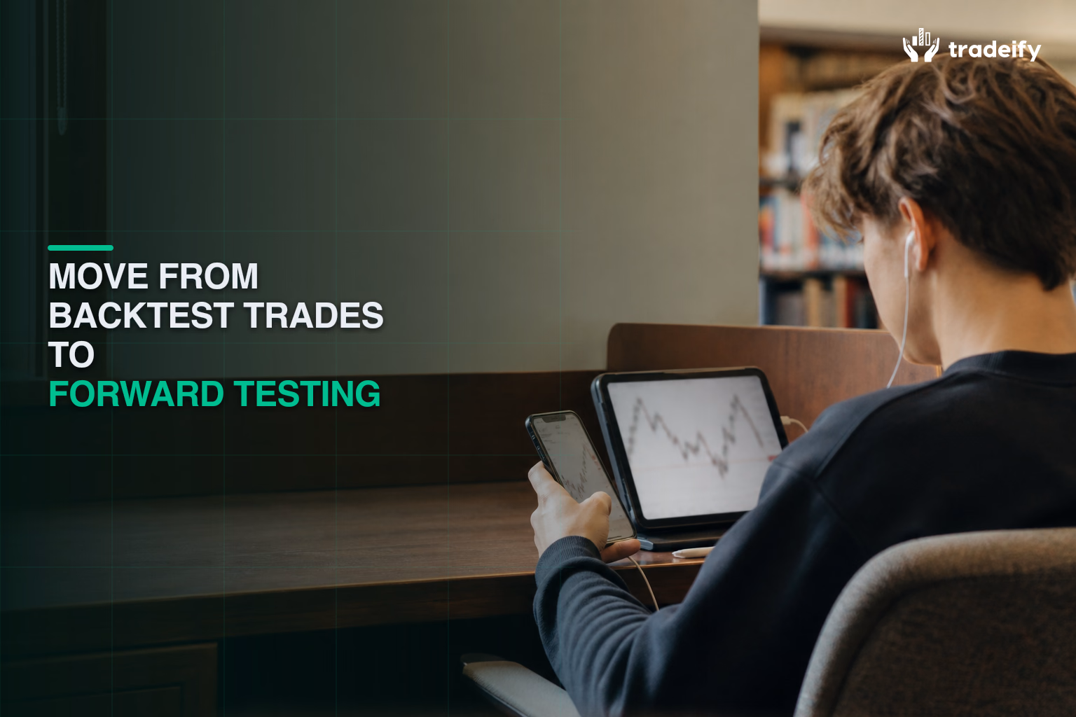 Trader forward-testing unchanged strategy rules with a phone and tablet in a quiet library study alcove