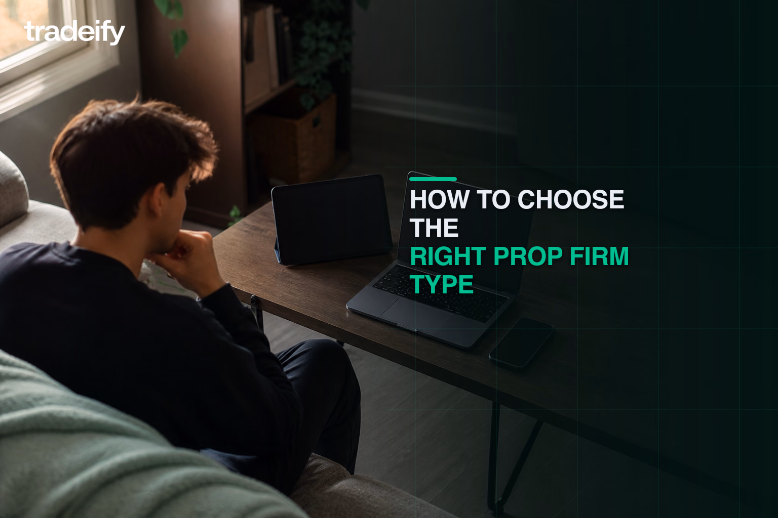 Trader comparing market fit account path and work setting from a comfortable couch
