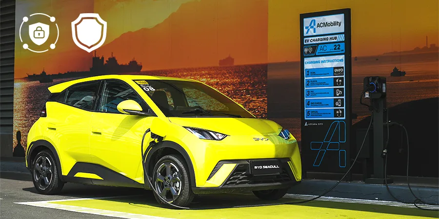 BYD Seagull EV charging at ACMobility station with safety icons, emphasizing secure electric vehicle charging in the Philippines