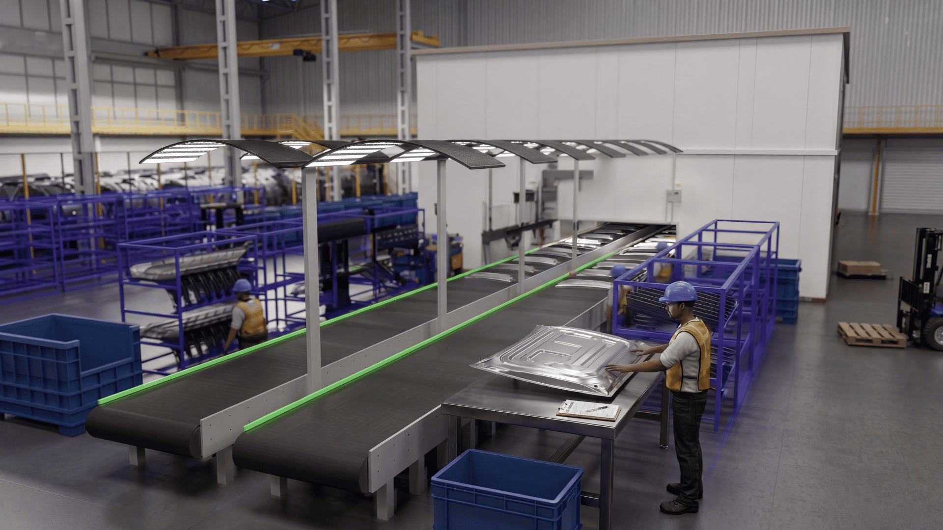 Industrial factory interior with a worker wearing a blue helmet and yellow vest inspecting a metal sheet on a table next to a conveyor belt system under overhead lights. Blue storage bins and racks holding metal parts are visible around the area.