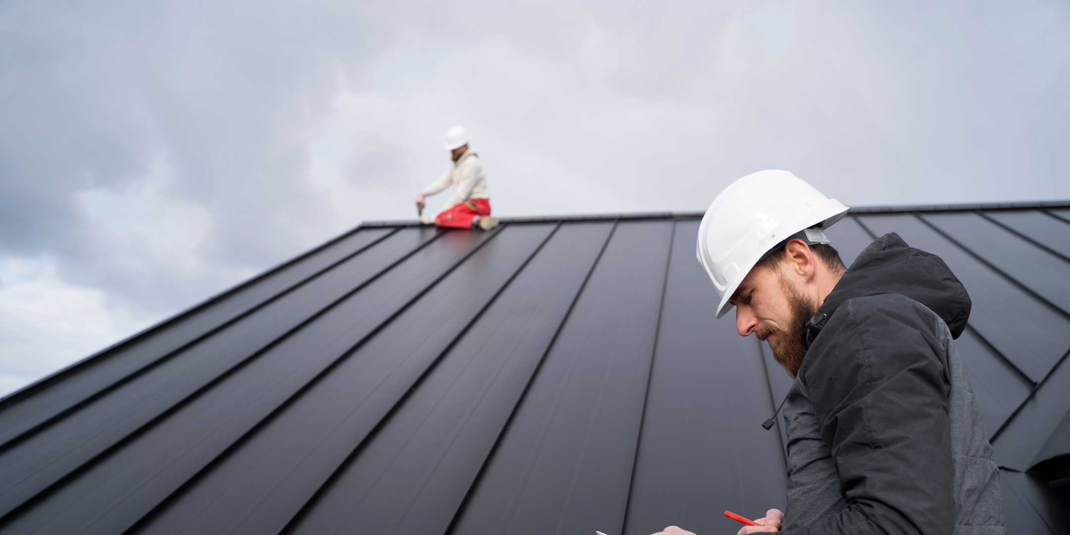 Roofing contractor reviewing financing options with homeowners