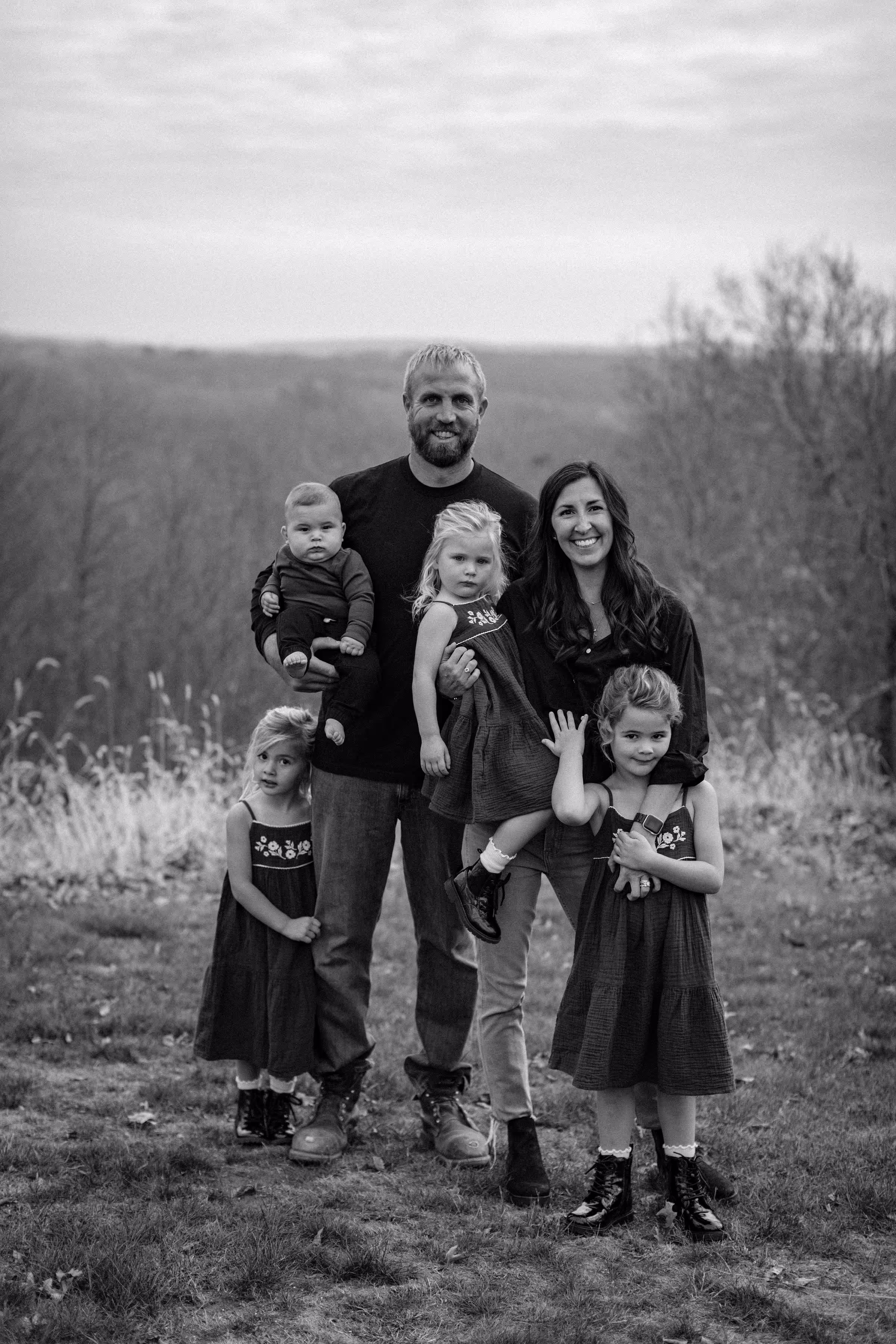 Owners of New Canaan Pool Service with their family outdoors in Connecticut