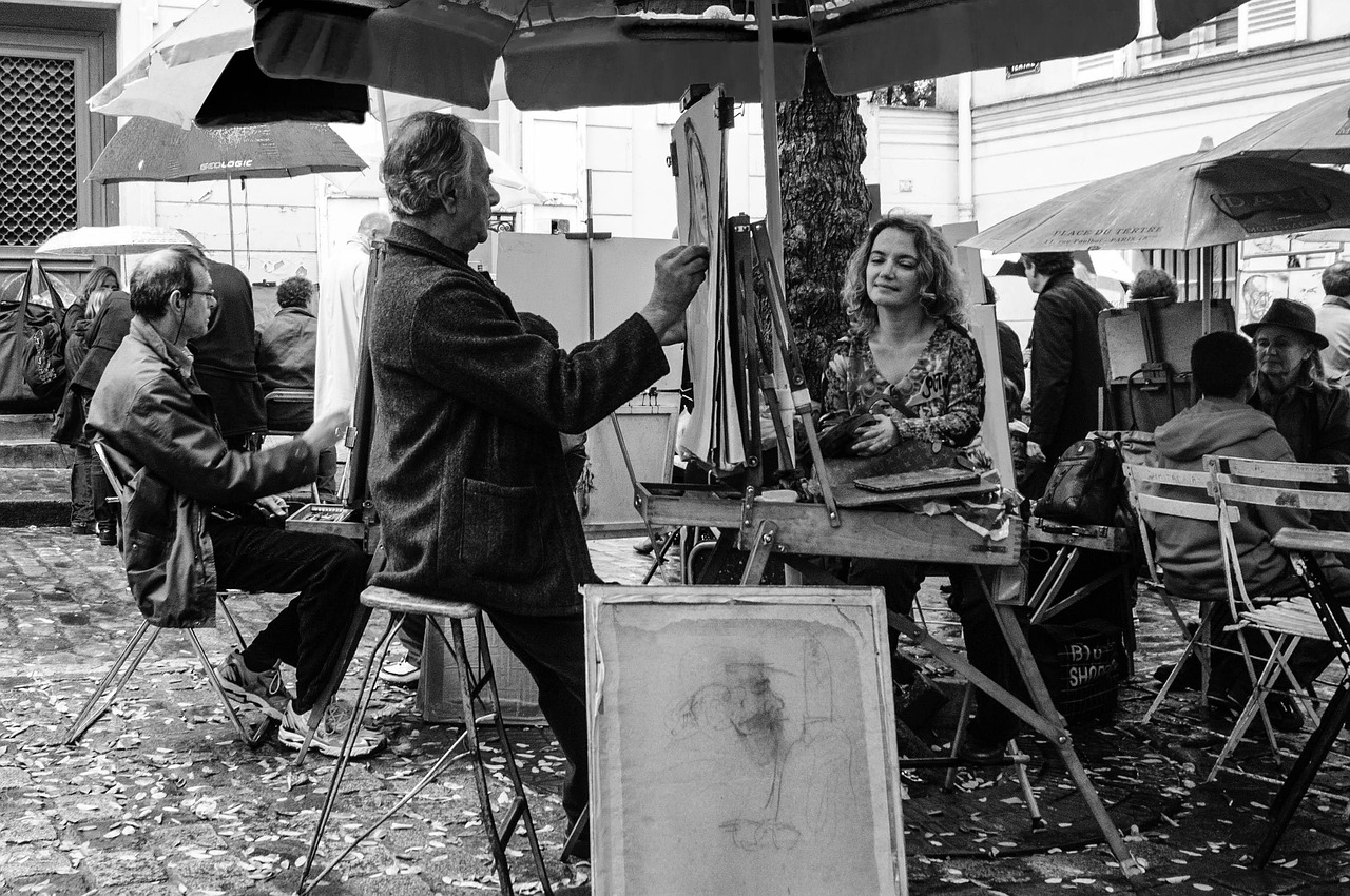 artistes faisant des portraits sur la place du Tertre