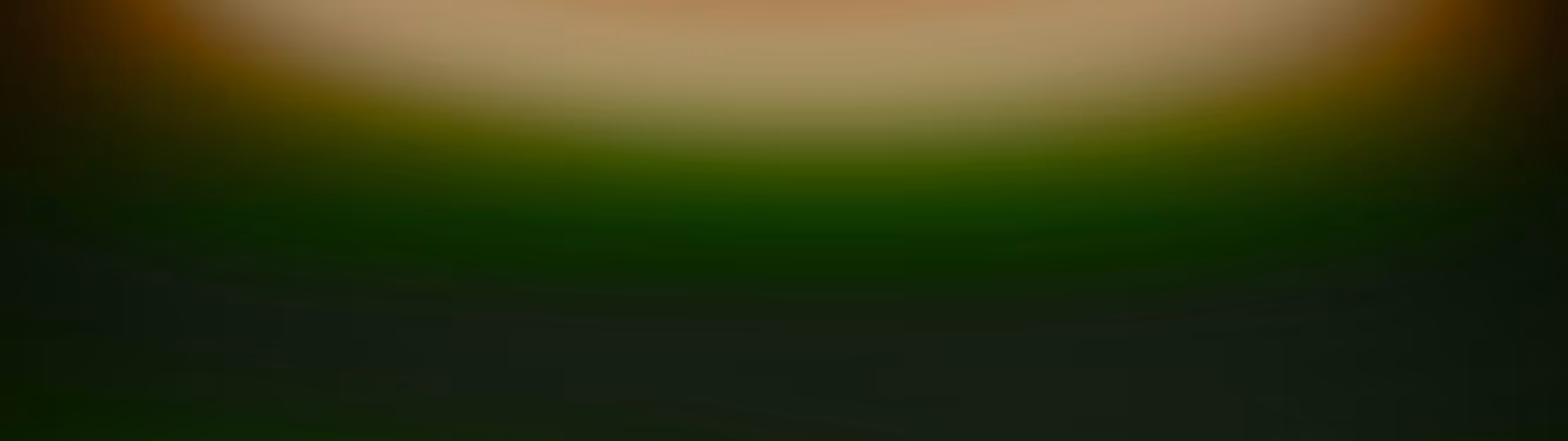 Blurred gradient background with dark green transitioning to a lighter green and brown tones.
