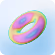 Colorful iridescent donut-shaped object with a smooth surface on a light blue background.