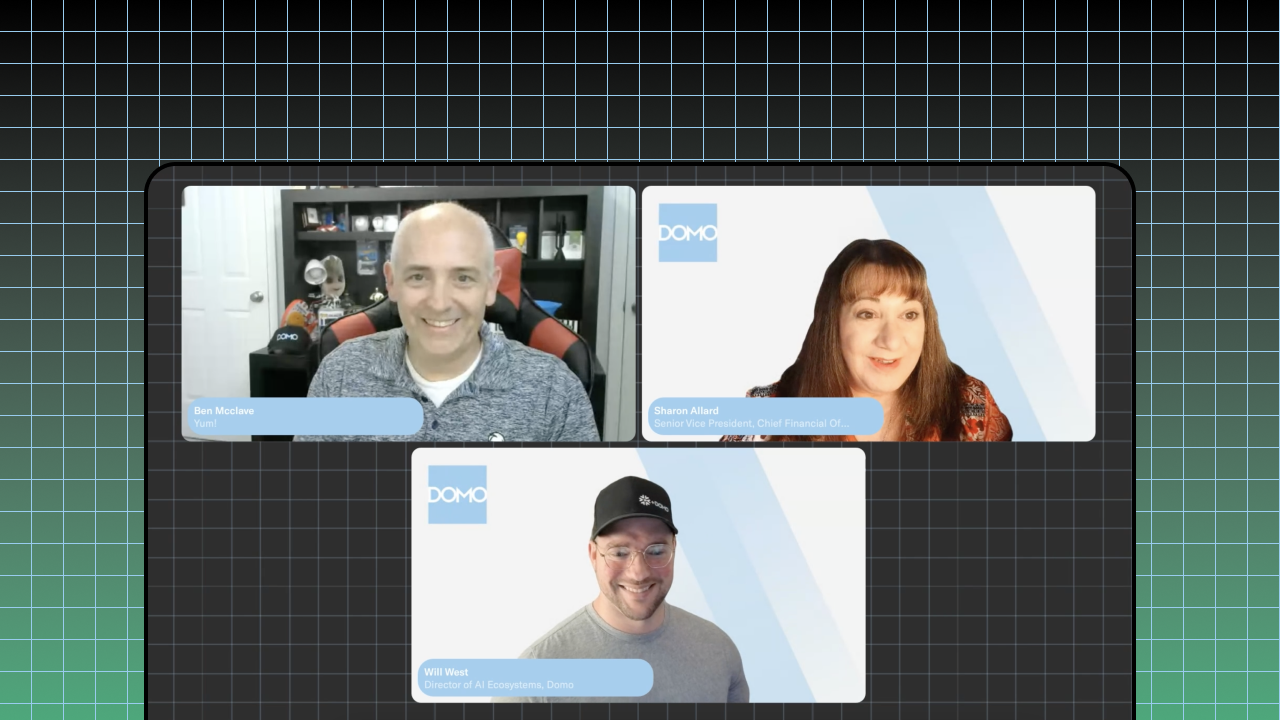 A video call of three people on a computer screen in front of a grid