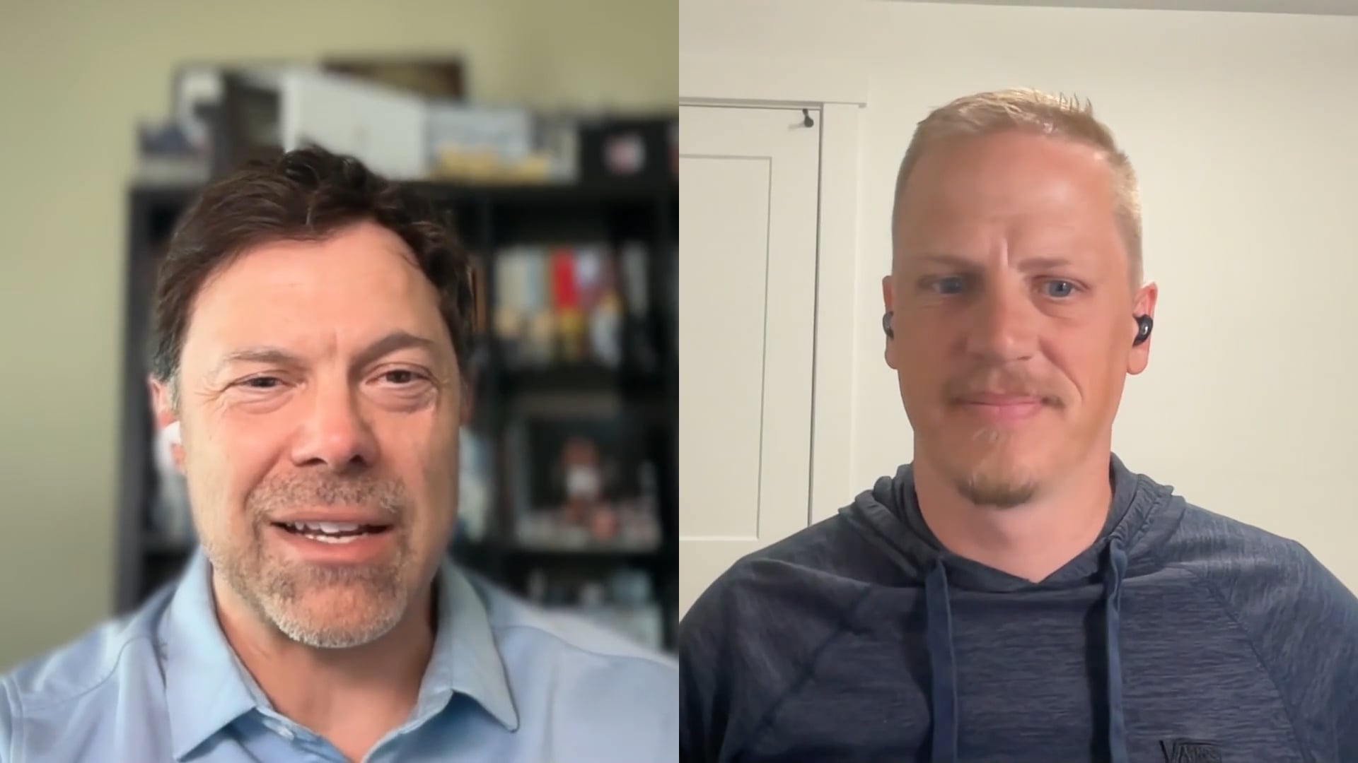Two men in a split-screen video call, one in a blue shirt with a bookshelf behind, the other in a hoodie.