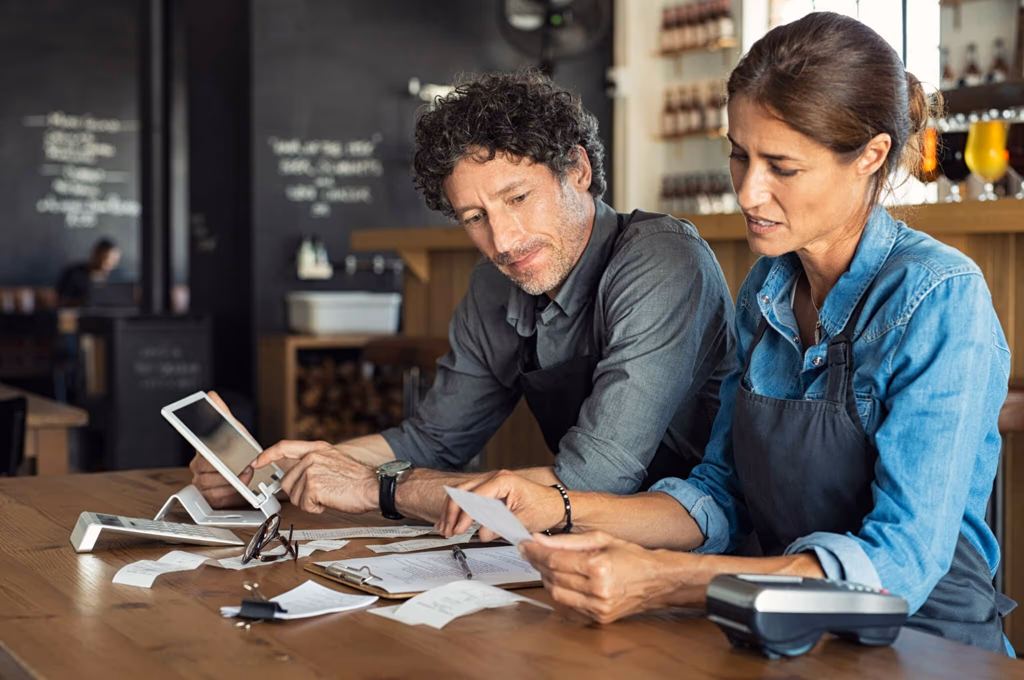 Staff calculating restaurant bill