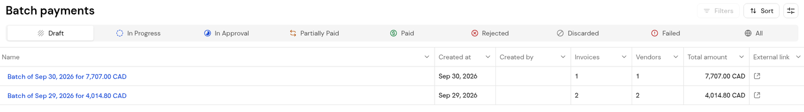 Batch payments with its status tabs and the External link column.