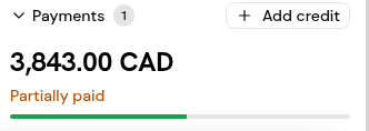 A partly paid invoice: the amount, Partially paid with its progress bar, and Add credit.