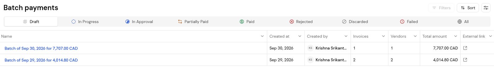 Batch payments with its status tabs, batch names, totals and the External link column.