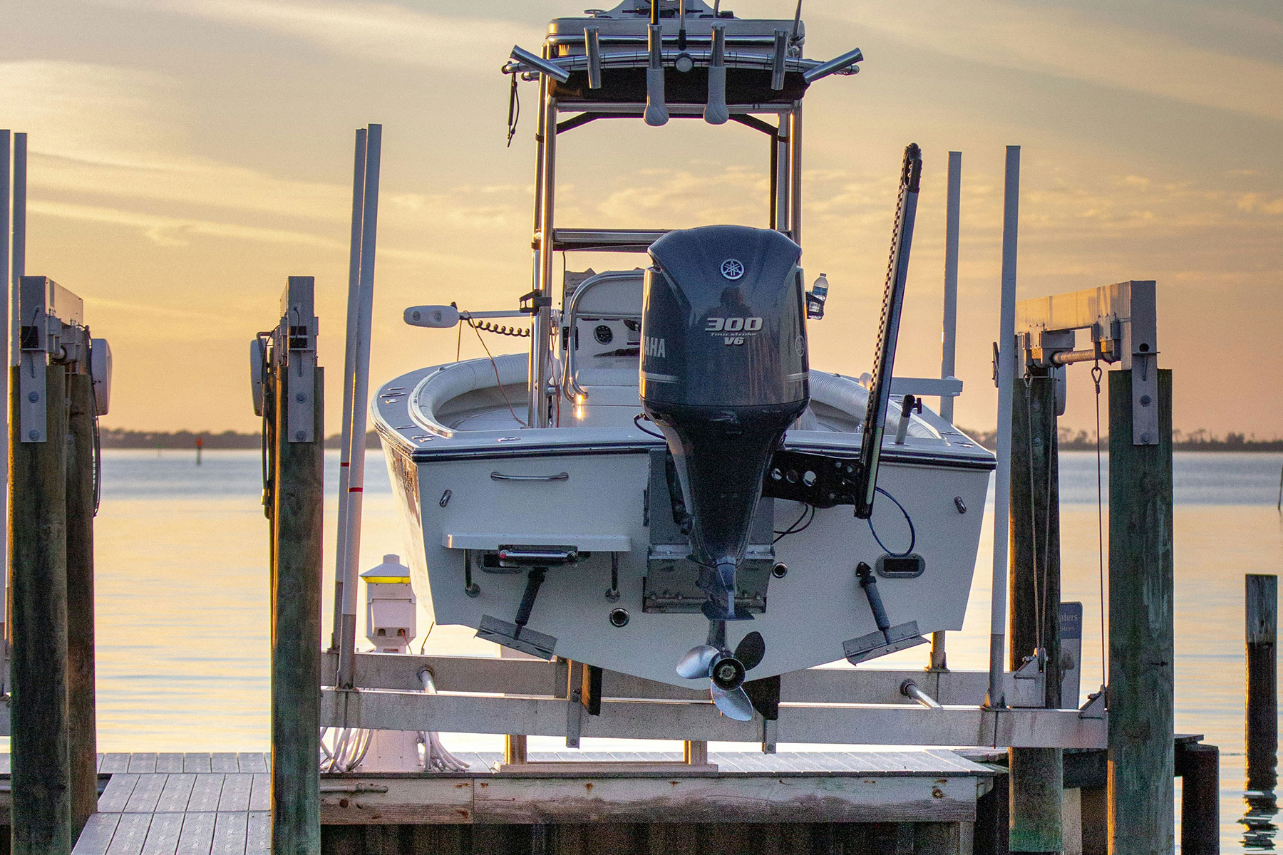 boat on boat lift at dock