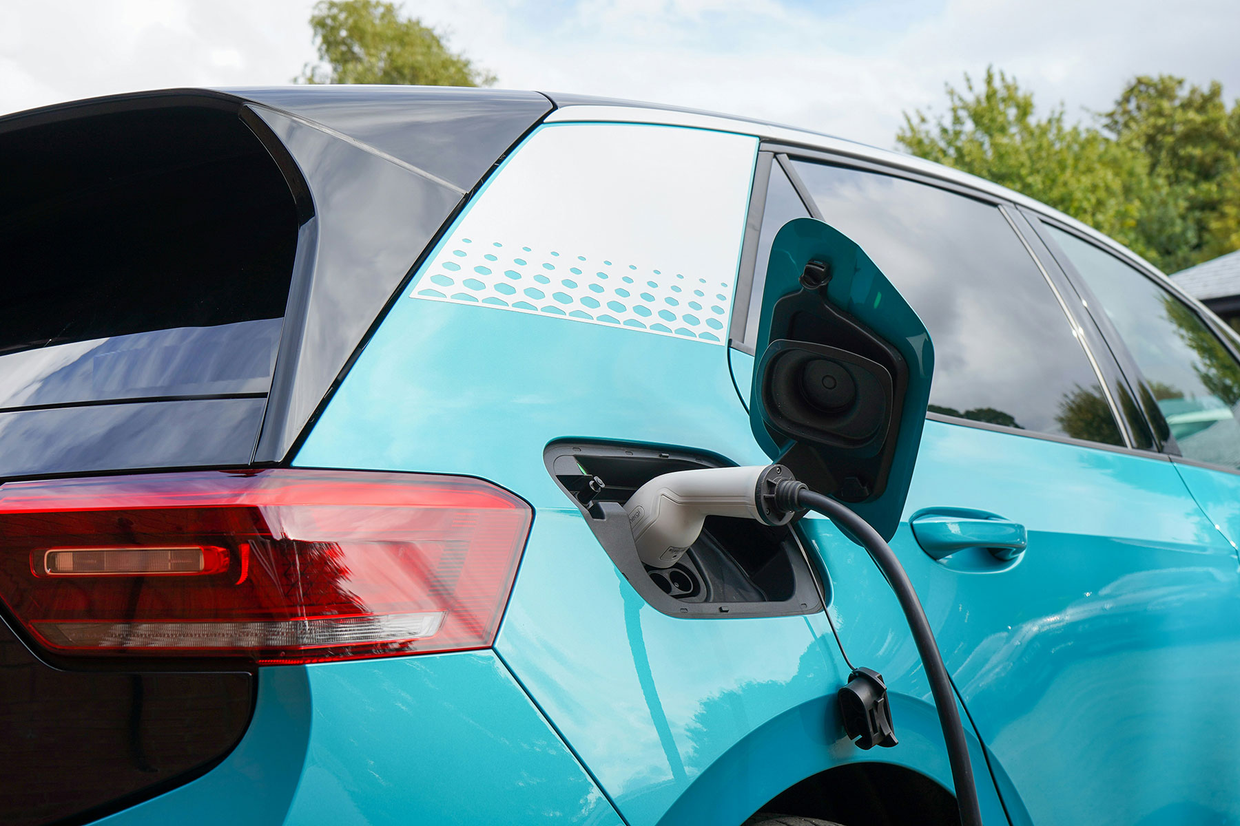 Blue EV car charging