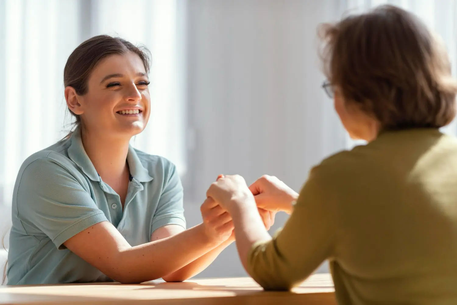 Counselor explaining how drug rehab works to a patient