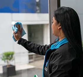 clean corp staff cleaning windows