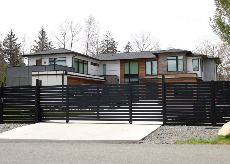 sleek black horizontal slat metal fence