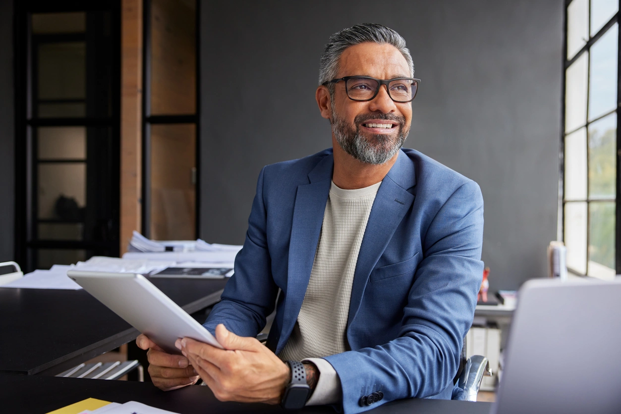businessman smiling through the window