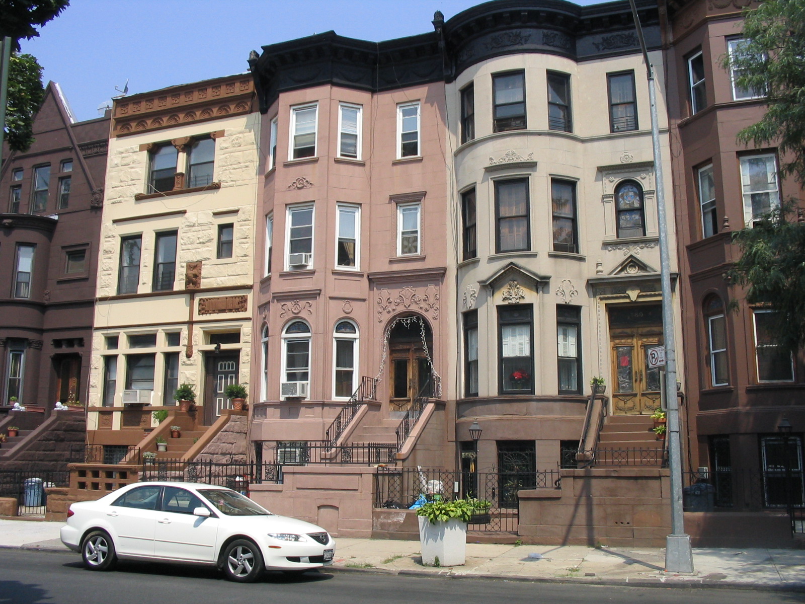 Intact Neo-Grec brownstone row houses with grand stoops in Bedford-Stuyvesant