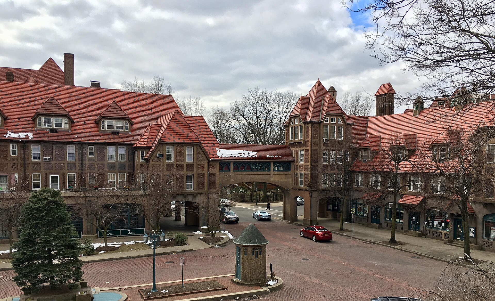 Historic brick-paved Station Square and Tudor-style architecture in Forest Hills Gardens