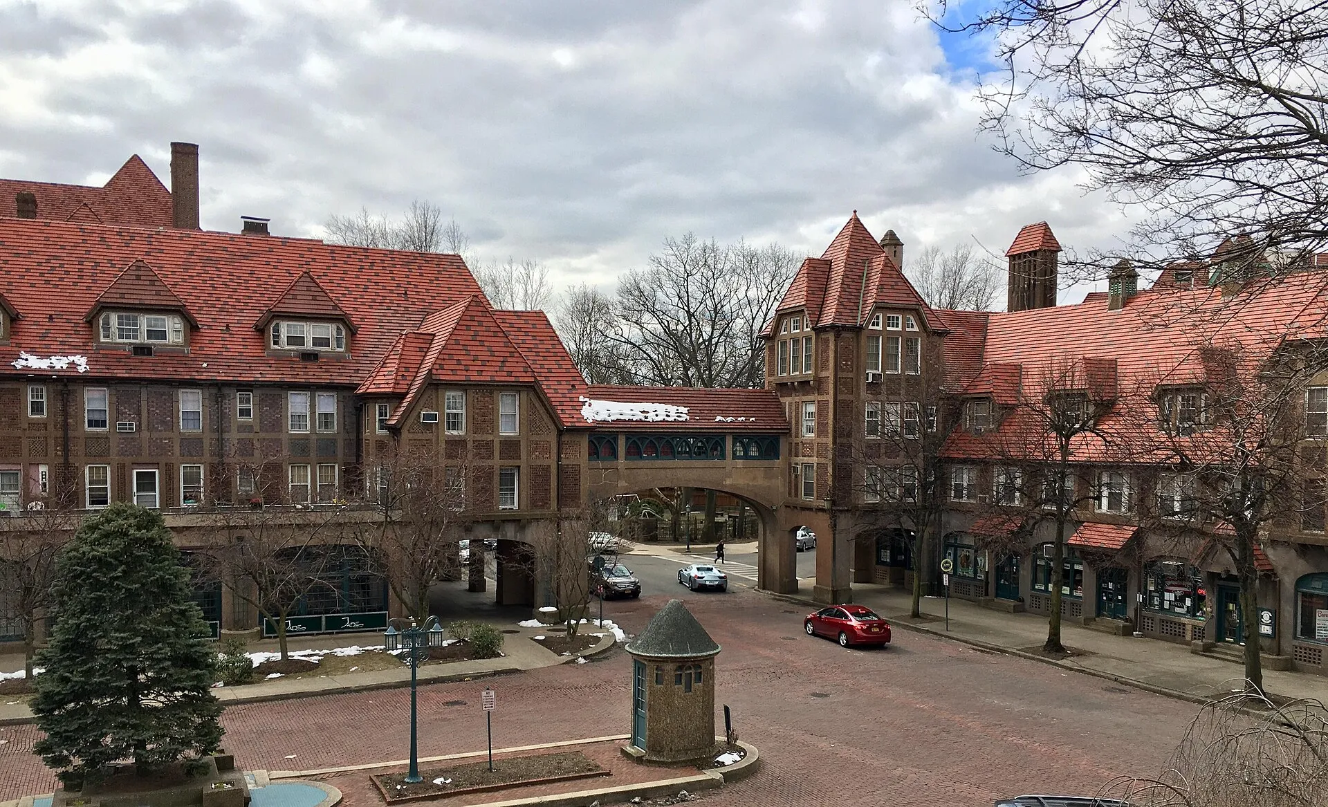Historic brick-paved Station Square and Tudor-style architecture in Forest Hills Gardens