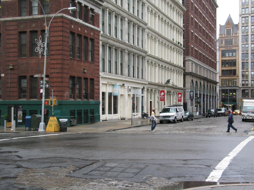 Contemporary and historic architecture along cobblestone Bond Street in NoHo