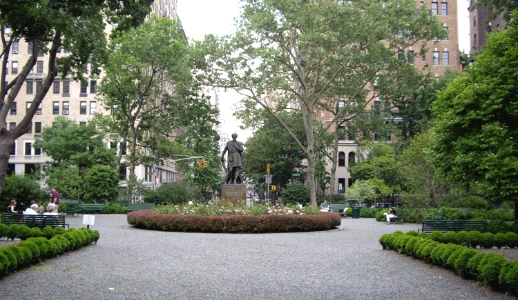 Historic townhouses and wrought-iron fencing surrounding private Gramercy Park
