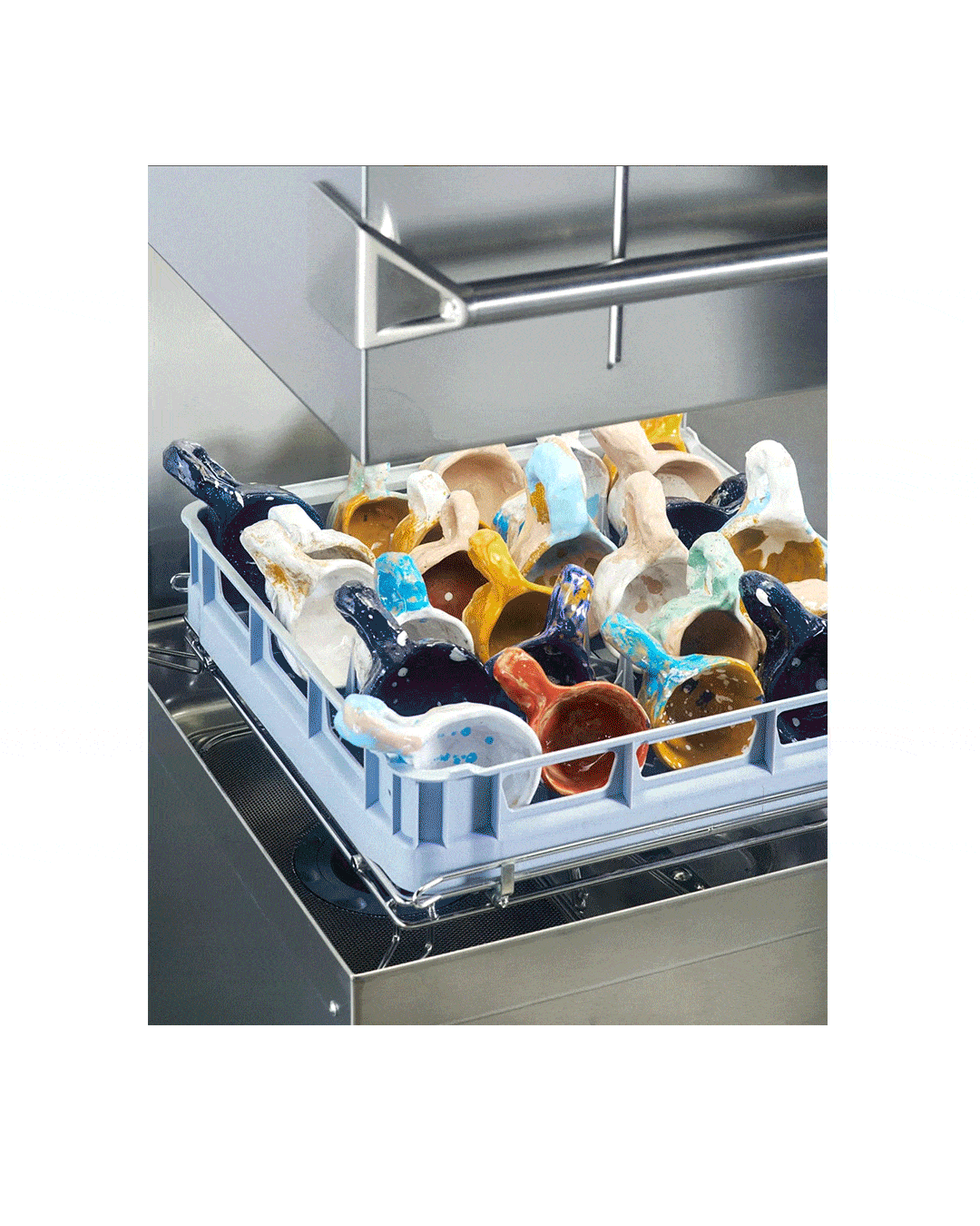 Branded retail display concept designed by N96, a Copenhagen-based creative brand studio, showcasing minimalist packaging for NIKO JUNE. The image features modular cube seating and stacked plinths with bold black typography on soft white surfaces, set in an industrial showroom environment. This visual identity and packaging solution merges Scandinavian design principles with bold brand expression — exemplifying N96’s expertise in strategic branding, retail activation, and creative direction for lifestyle and design-led brands.