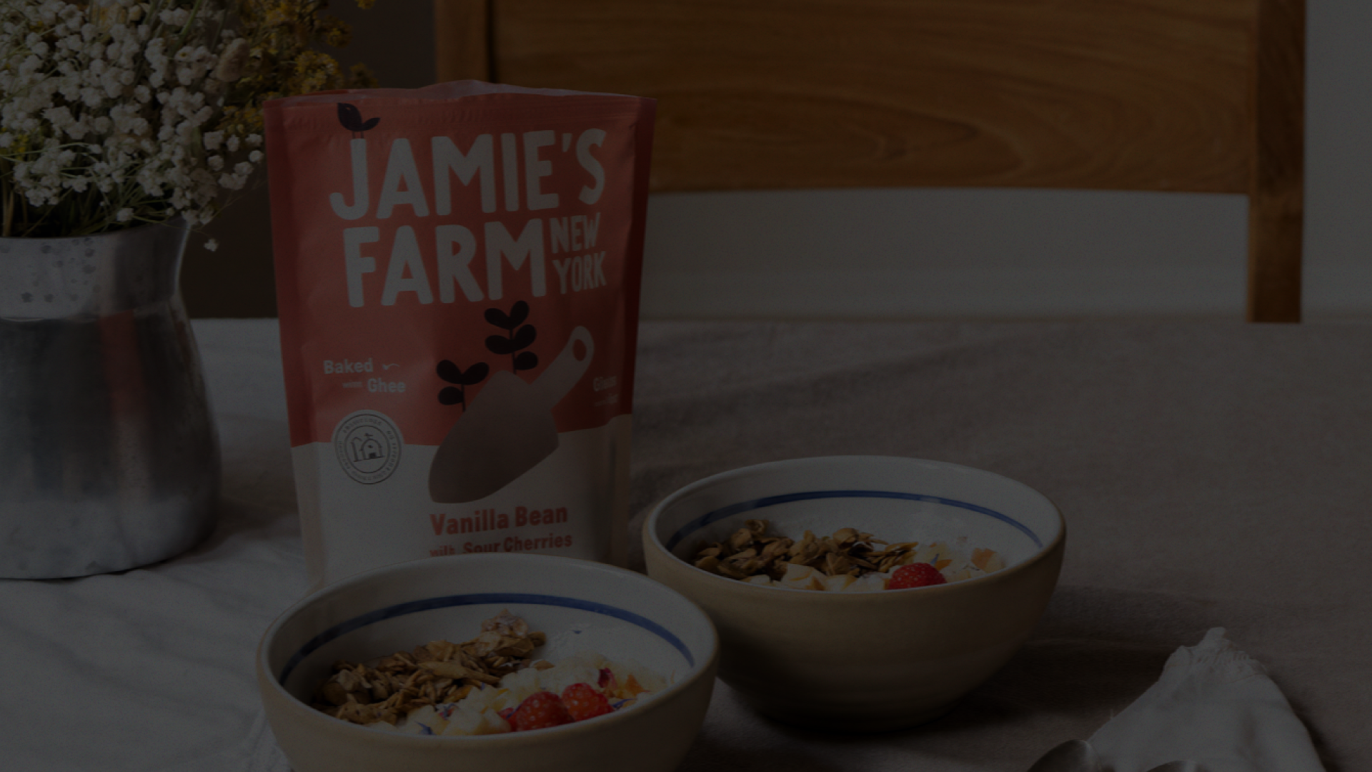 Jamie's Farm New York Vanilla Bean granola packaging with two bowls of granola and berries — brand identity design by n96 branding agency Copenhagen