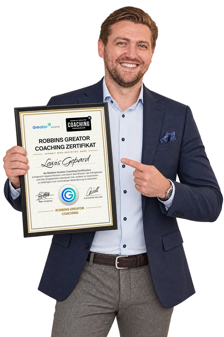 Dr. Frederik Hümmeke mit dem gerahmten Robbins Greator Coaching Zertifikat