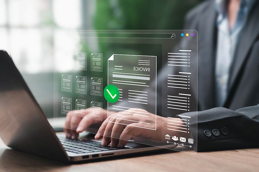 A member of a finance team using accounts payable automation