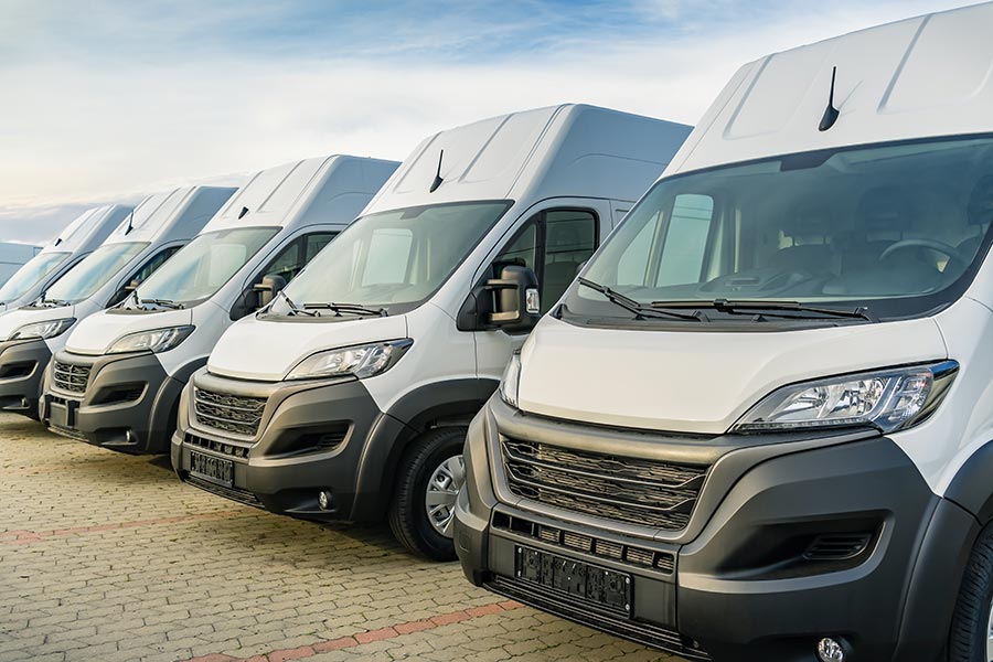 A fleet of service vehicles representing assets a business must manage
