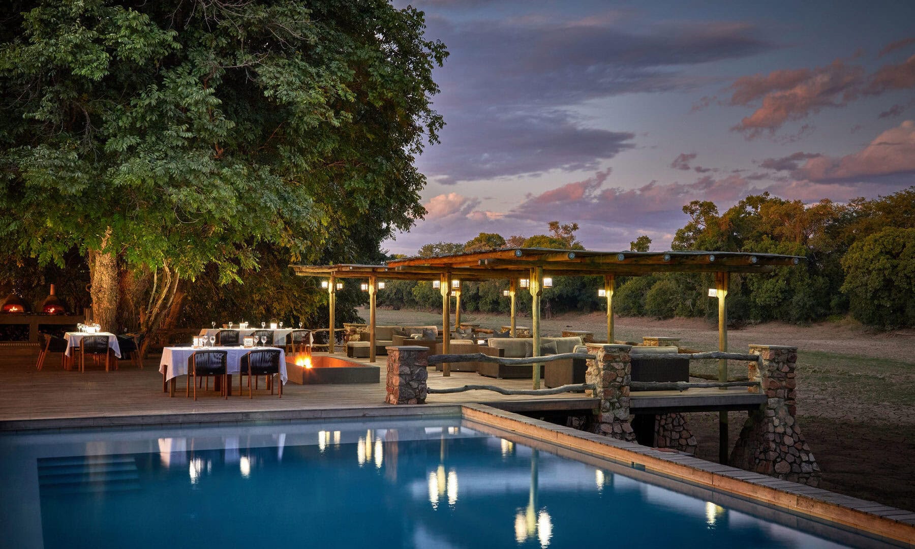 Relax in the infinity pool with hippos and birds as your companions.