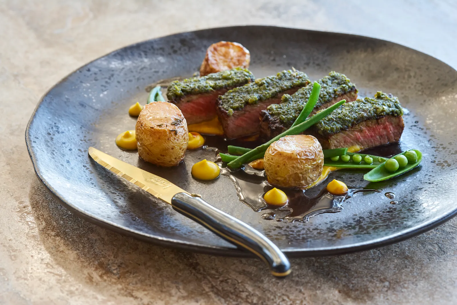 Zimbabwean and international flavors with gourmet wine cellar and farm to table ingredients.