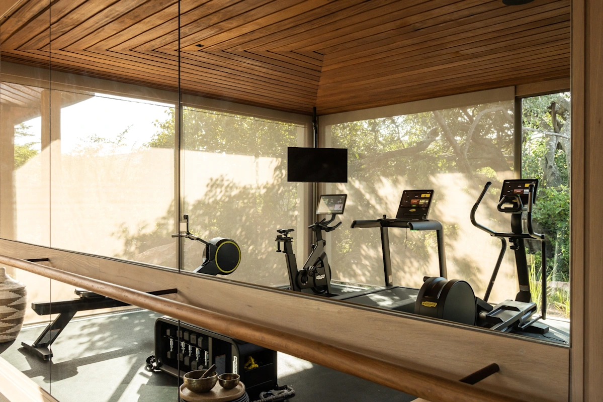 Wellness and fitness with a full gym, spa treatments, yoga, and in-villa therapies.