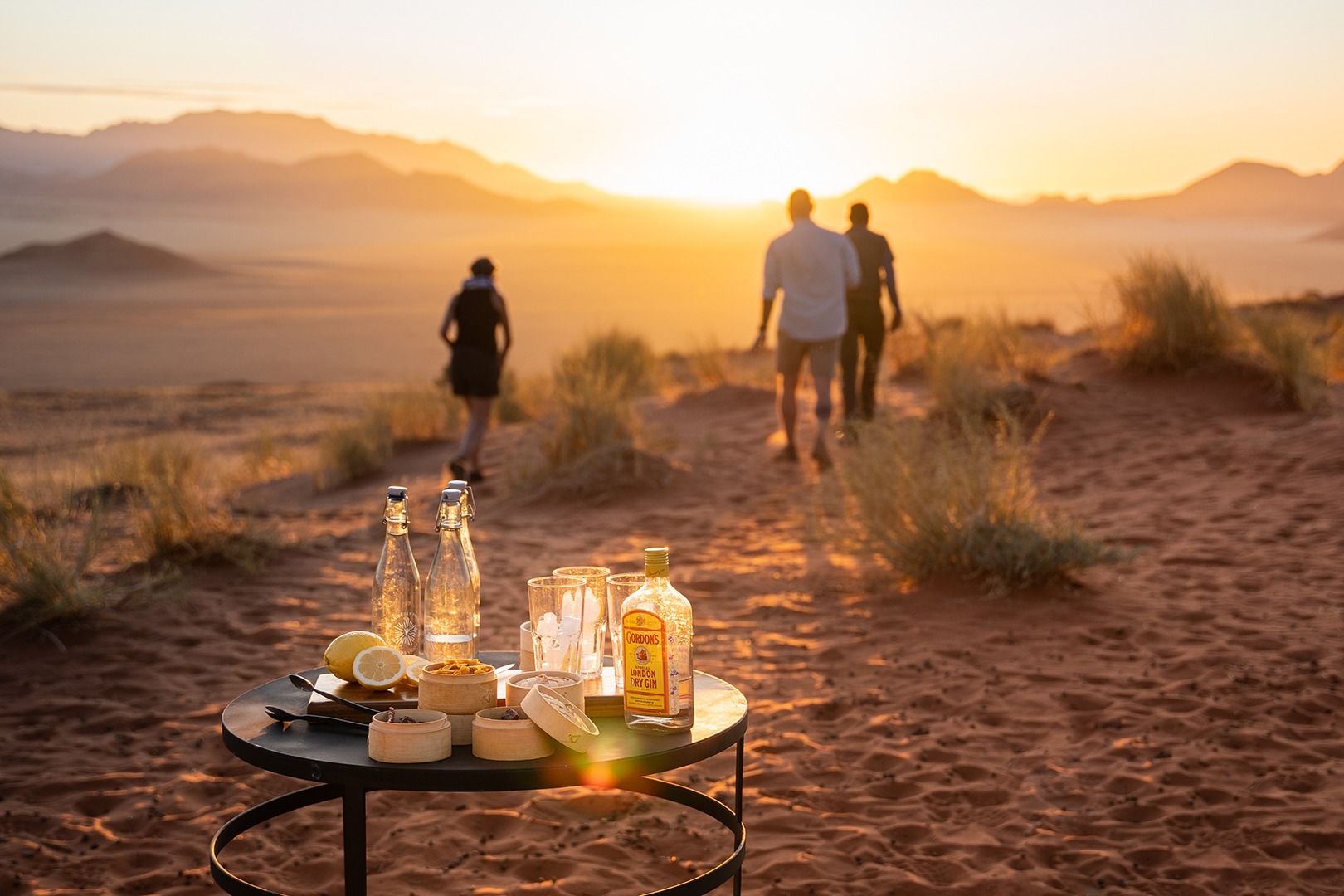 Sunset drives to iconic viewpoints for magical photo ops and drinks in the dunes.