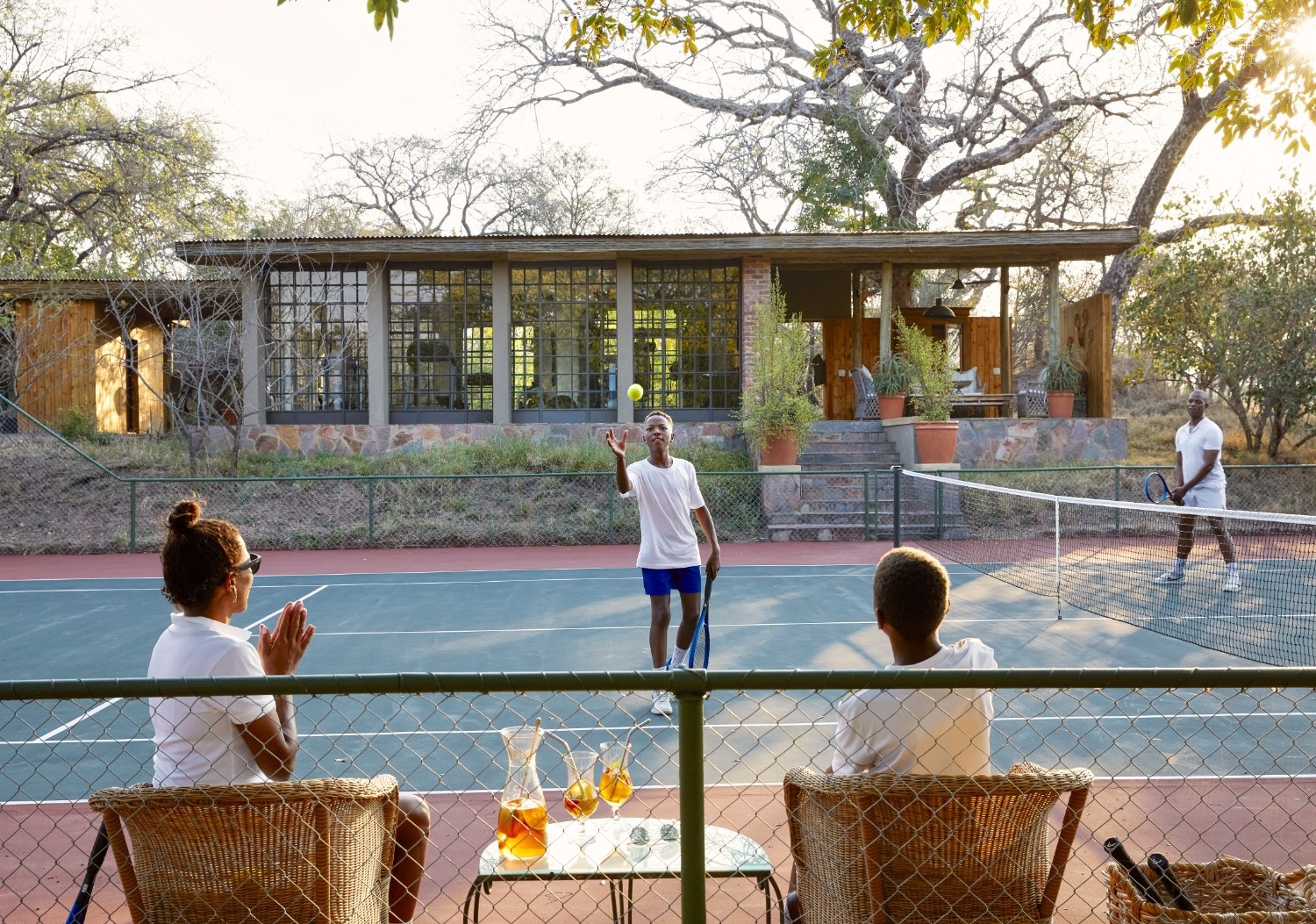 Cool off in your own pool or enjoy a game of tennis with a wild backdrop.