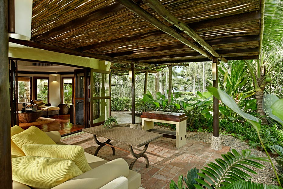 Spacious two-story pavilions surrounded by tropical gardens, offering privacy and comfort.