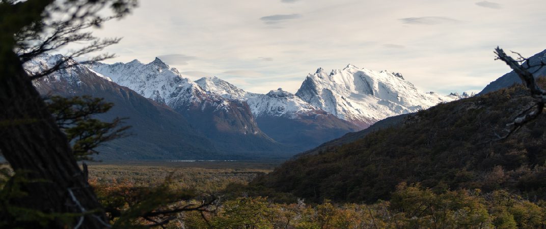 Views of Fitz Roy and Patagonia’s dramatic granite peaks define the experience.
