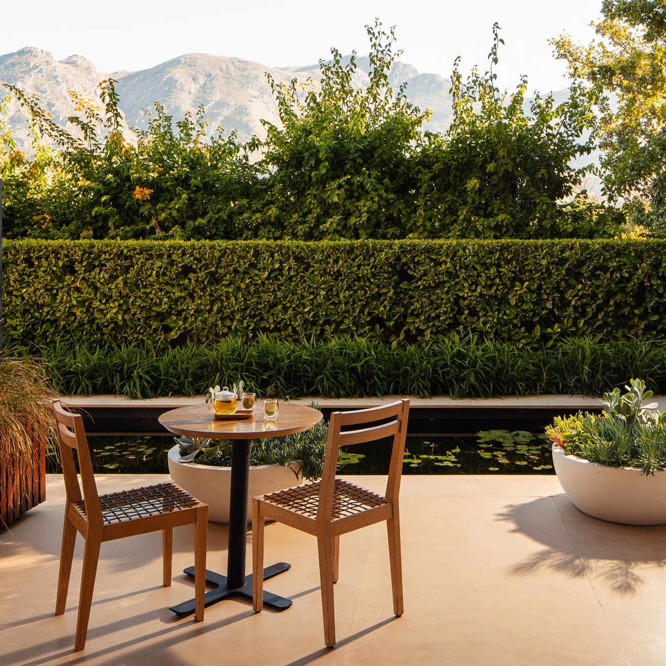 Relax beside a tranquil swimming pool overlooking the mountains.