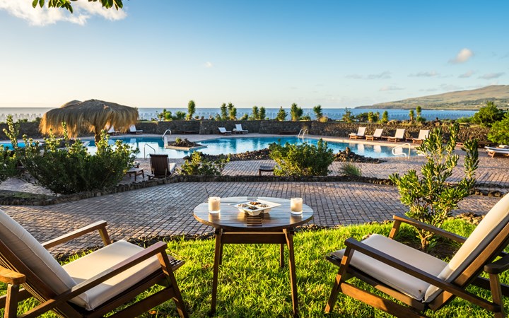 A dramatic Pacific-facing pool designed to blend seamlessly into the volcanic coastline.