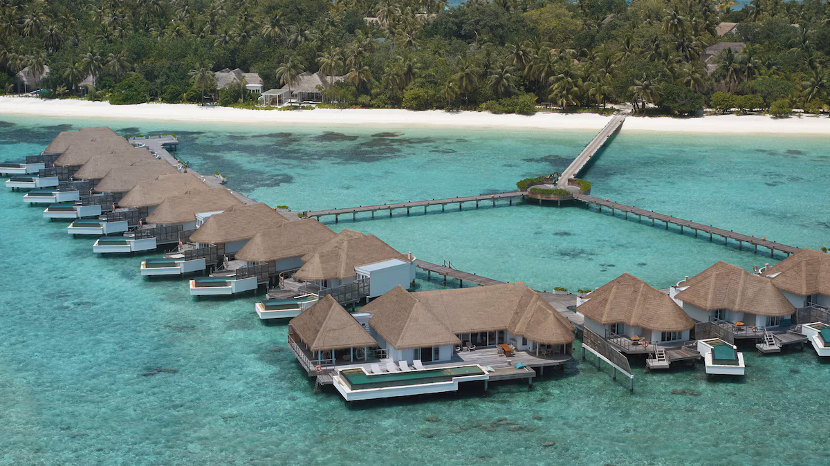 Luxury villas positioned directly above the lagoon.