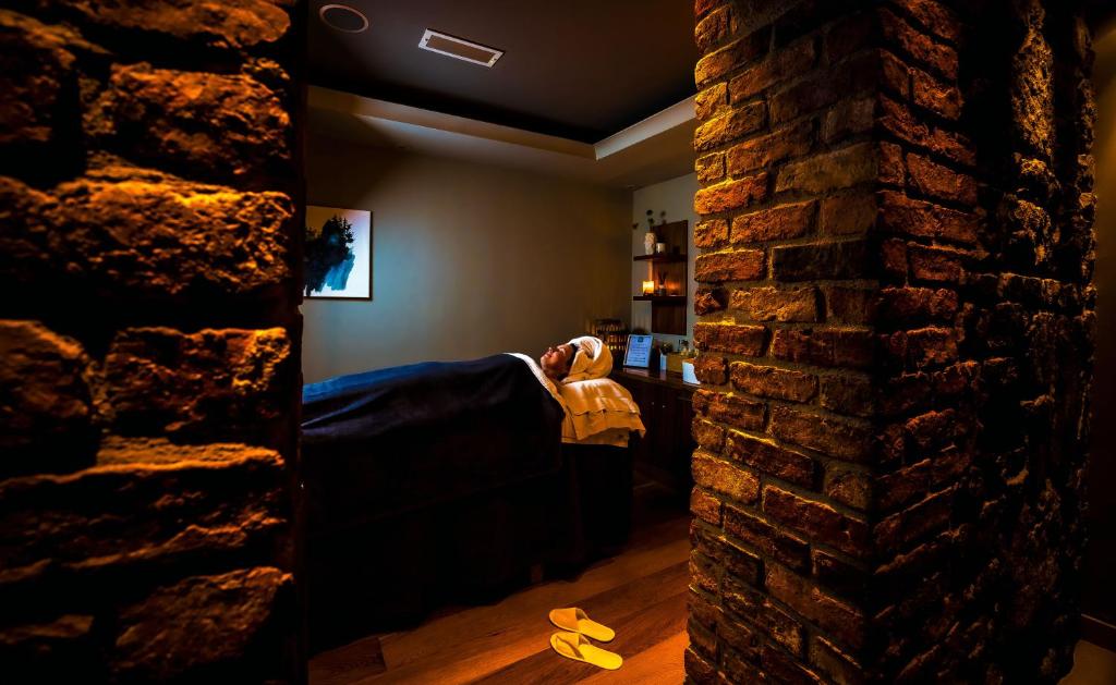 An organic urban wellness spa tucked into the property's vaulted basement.