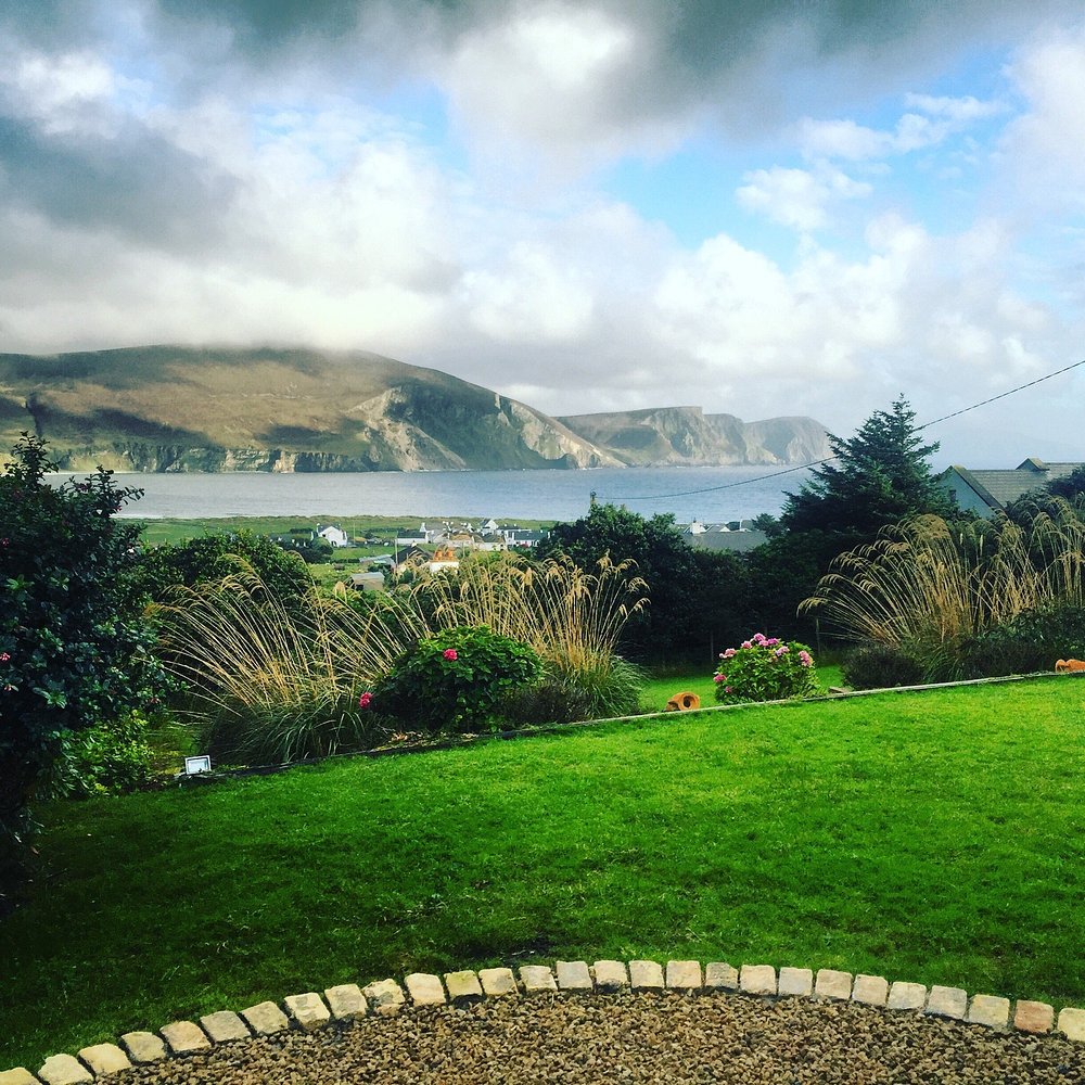 Look across Keel Strand, Minaun Cliffs, Keel Lake and toward Slievemore from the property and selected rooms.