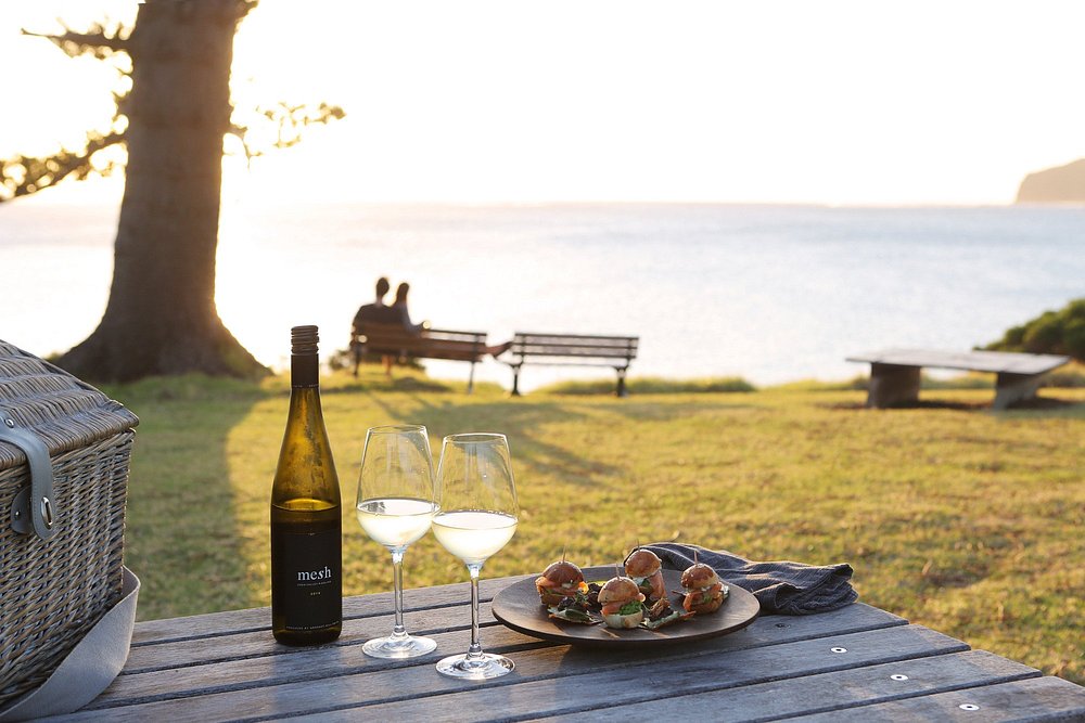 The lodge's restaurant showcases seasonal Australian cuisine using fresh local produce and premium seafood, complemented by an extensive wine collection and relaxed island hospitality.
