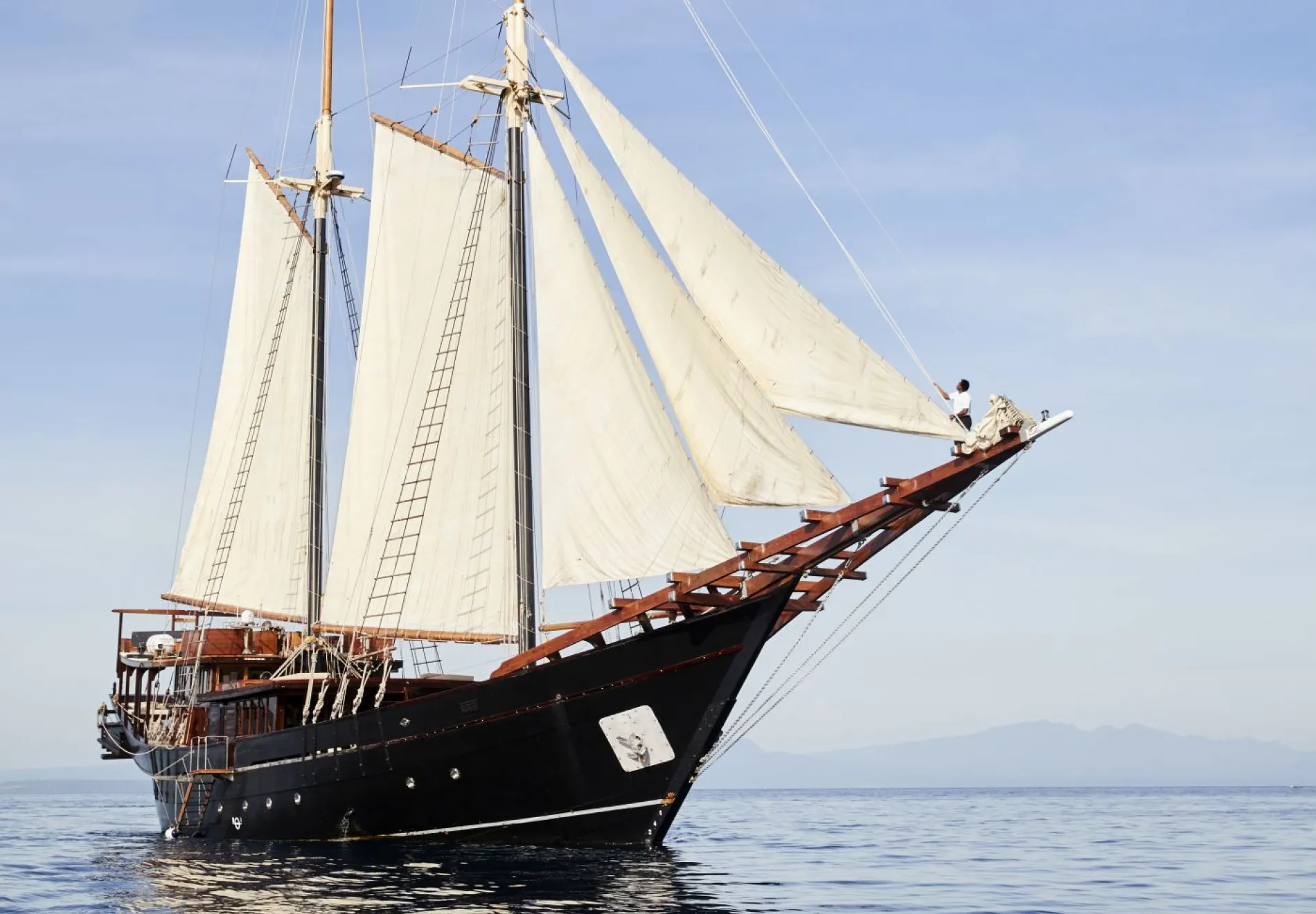 A fully private 52-metre Phinisi accommodating up to 10 guests across five air-conditioned cabins. 