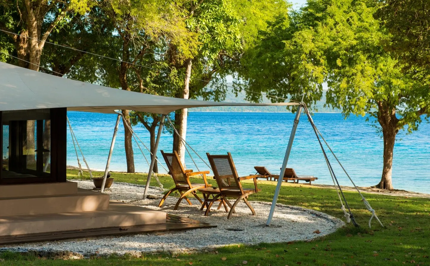 The 58-square-metre Ocean Front Tents stand directly on the shoreline with uninterrupted Flores Sea views.