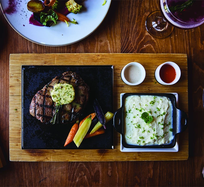 Daily gourmet meals and non-alcoholic beverages feature fresh, seasonal and regional ingredients. Three chef-prepared meals are included daily.